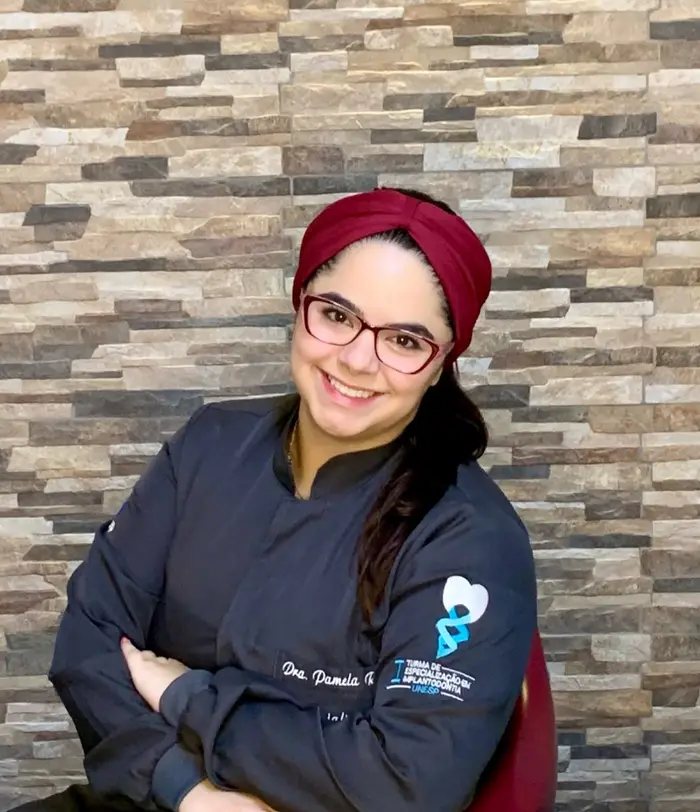 Retrato de Dra. Pamela Ricco, Cirurgiã-dentista.